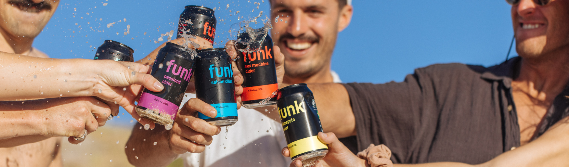 Funk Cider Cans Being Toasted