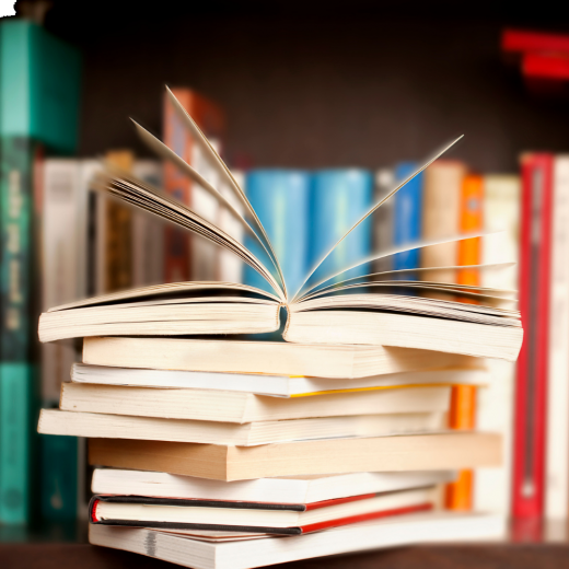 Open book in front of book shelf
