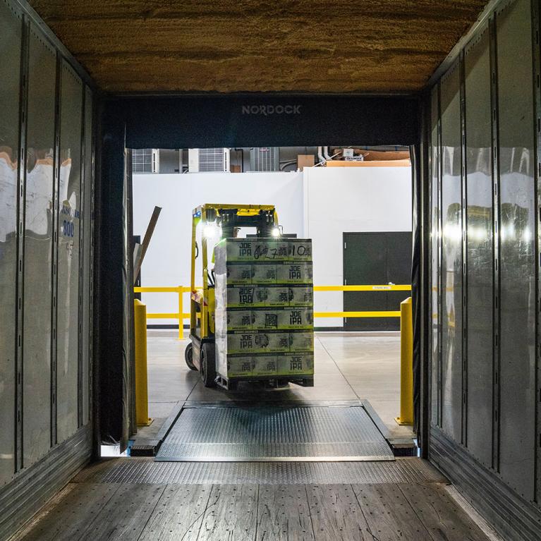 A Forklift Delivering Signet's Pallet Shipping Materials