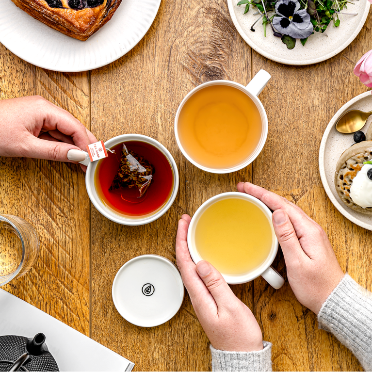 Drinking Tea Drop tea in cups on table