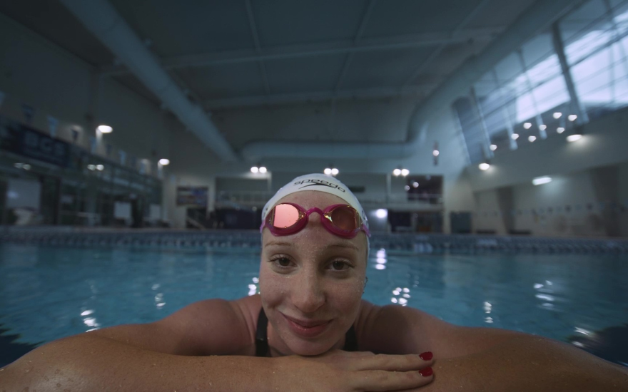 Mollie O'Callaghan Smiling by Pool