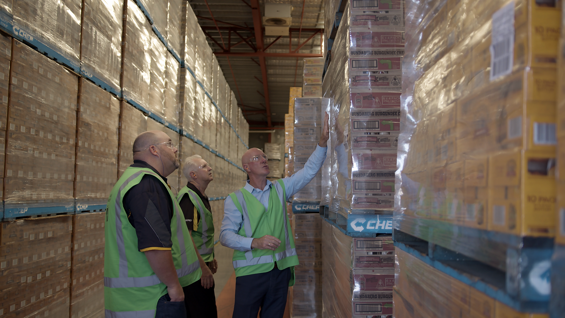 A Forklift Carrying Boxes Packaged Using Pallet Shipping Material