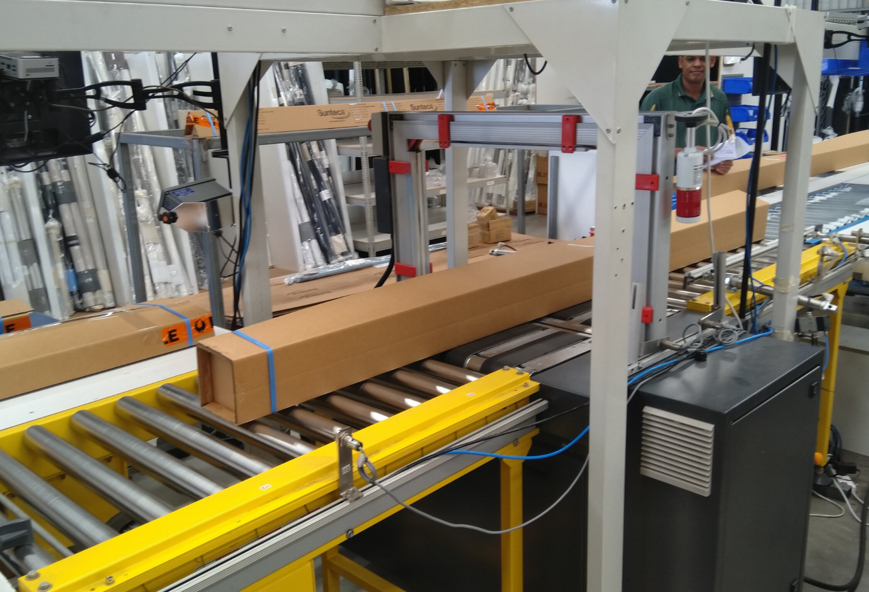 Automatic strapping of cartons