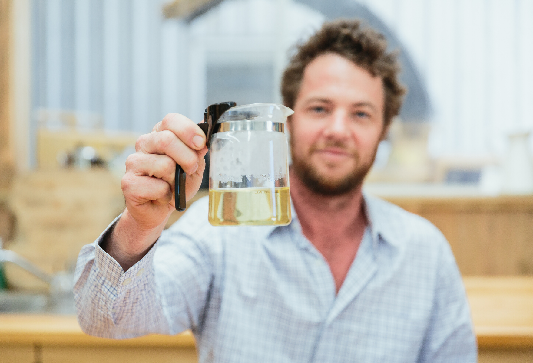 Brandon Collins holding tea pot