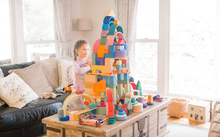 Child playing with Oskar's Wooden Ark Toys