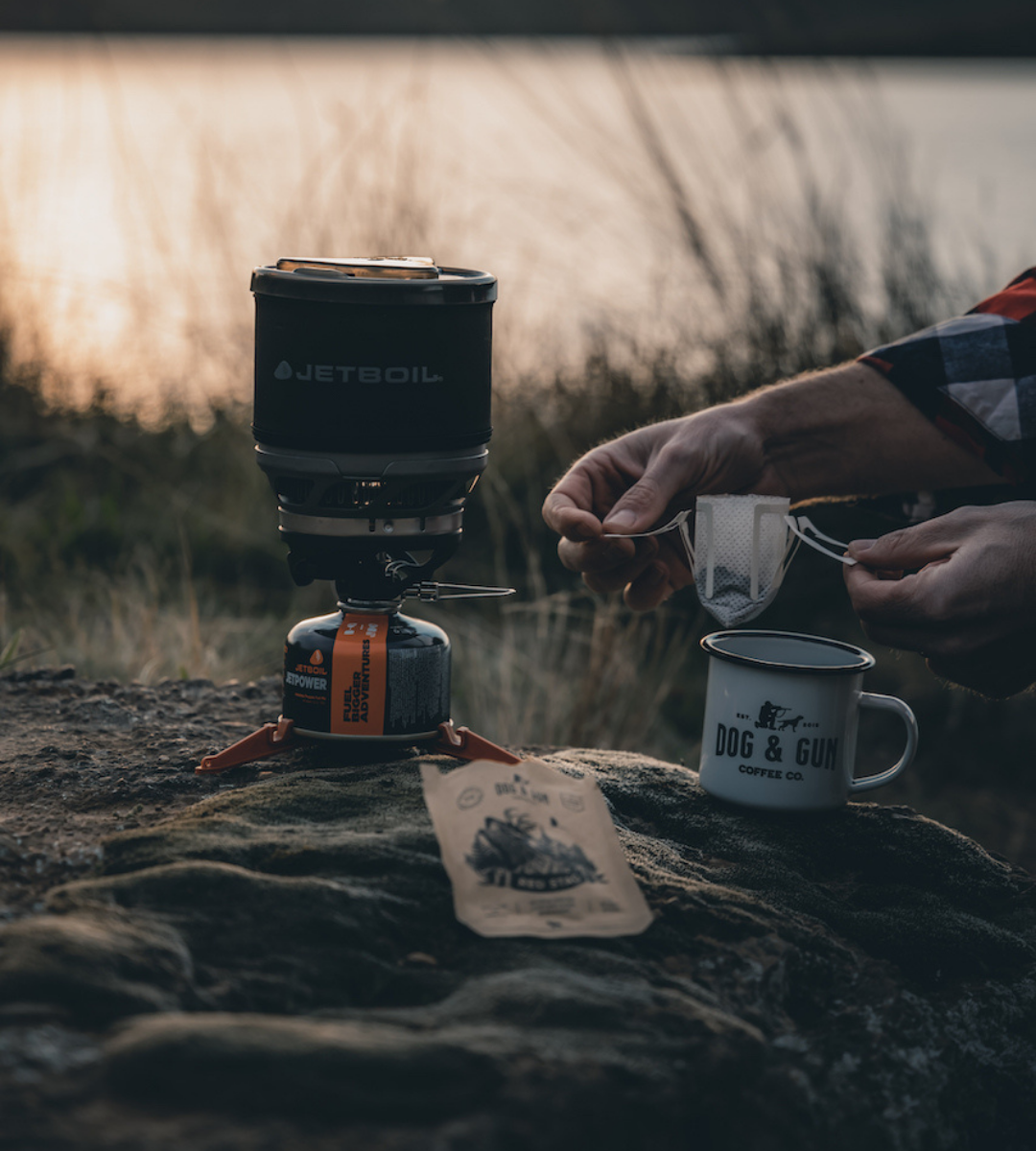 Dog & Gun Coffee by a Lake