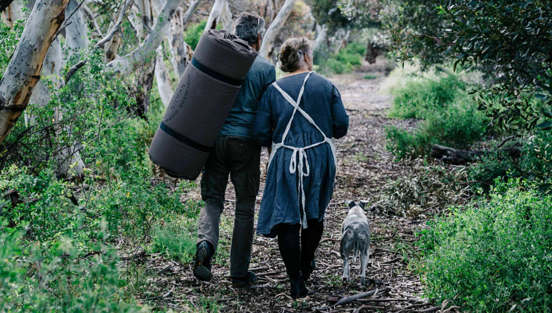 Gabrielle and John Andrews walking with Murchison River Swag