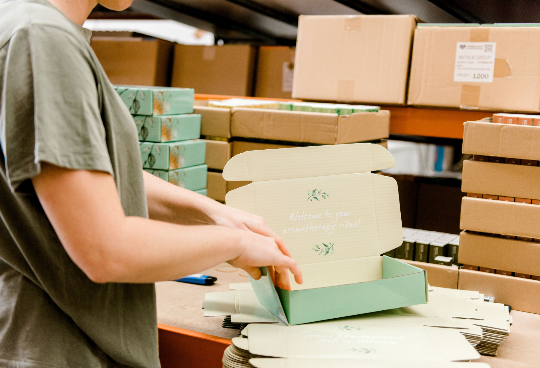 ECO. team member packing an order