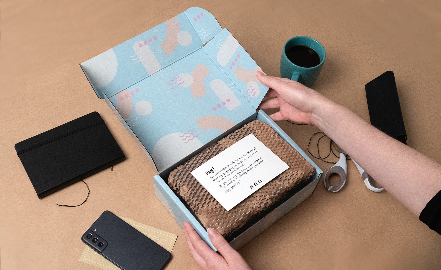 Person opening mailing box
