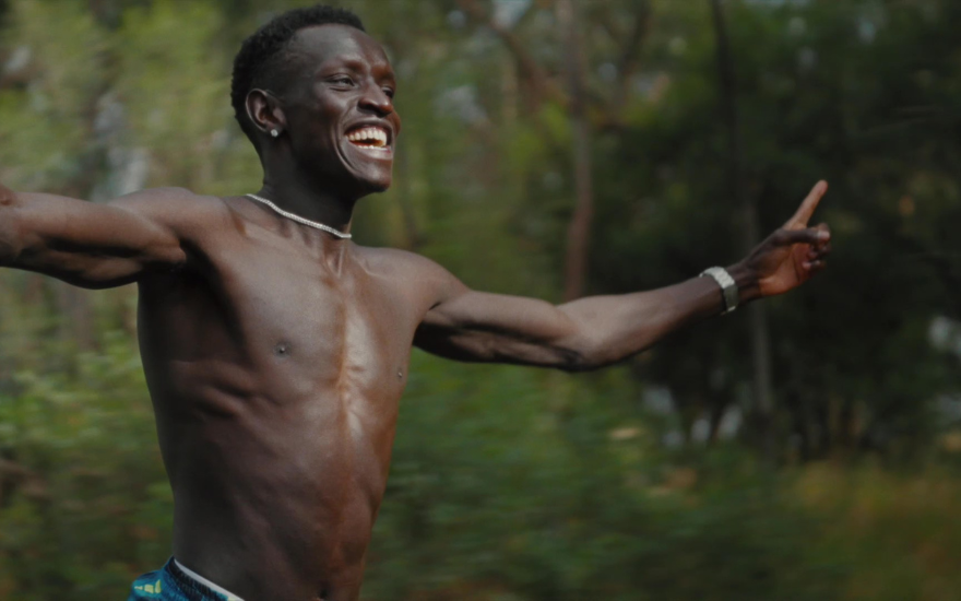 Peter Bol enjoying running with a smile