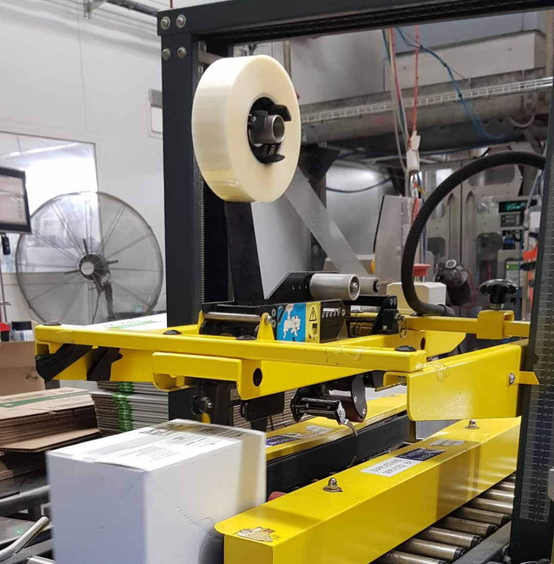 Signet Machine Carton Sealer on Trump line