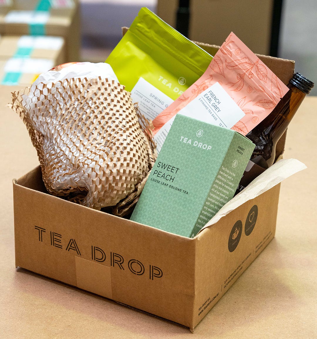 Tea Drop products in Carton with Signet Geami paper