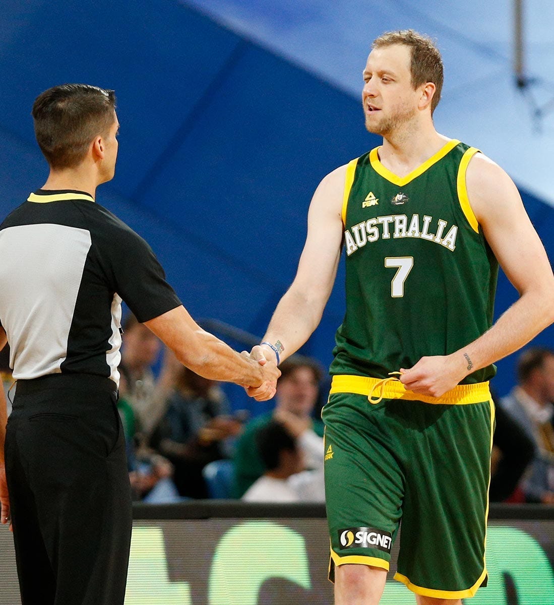 Joe Ingles shaking hands with referee