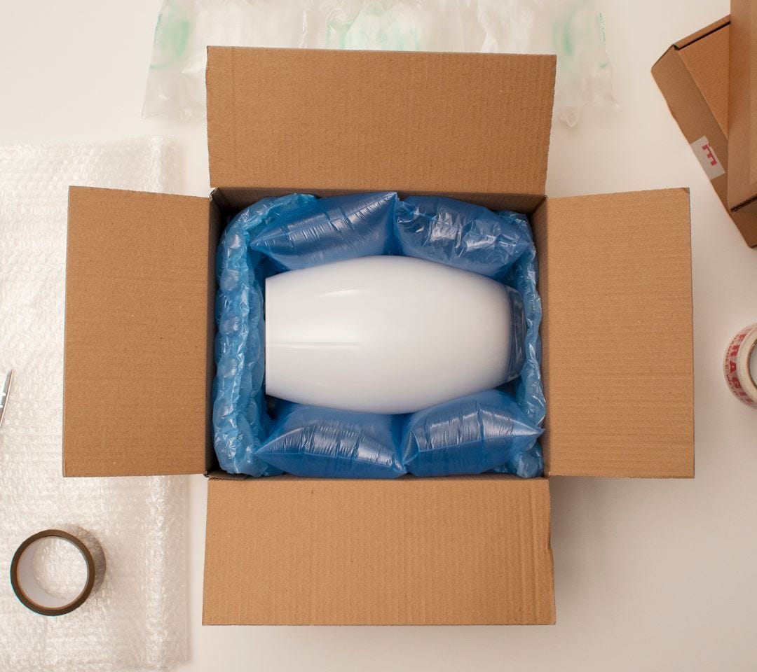 Box being packed with Bubble Wrap